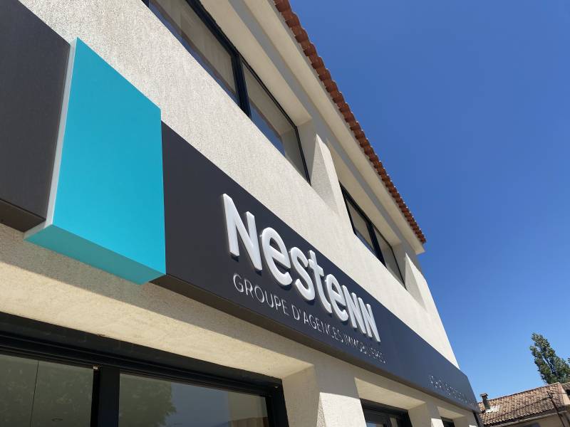Fabrication d'enseigne réseau d'agence immobilière NESTENN à Bouc Bel Air